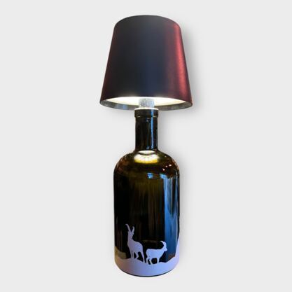 Glasflasche mit Lampe Silhouette Steinbock