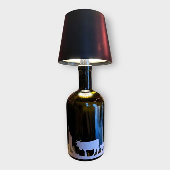 Glasflasche mit Lampe Silhouette Alpabzug klassisch